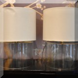 DL05. 2 Round glass lamps with white shades. 